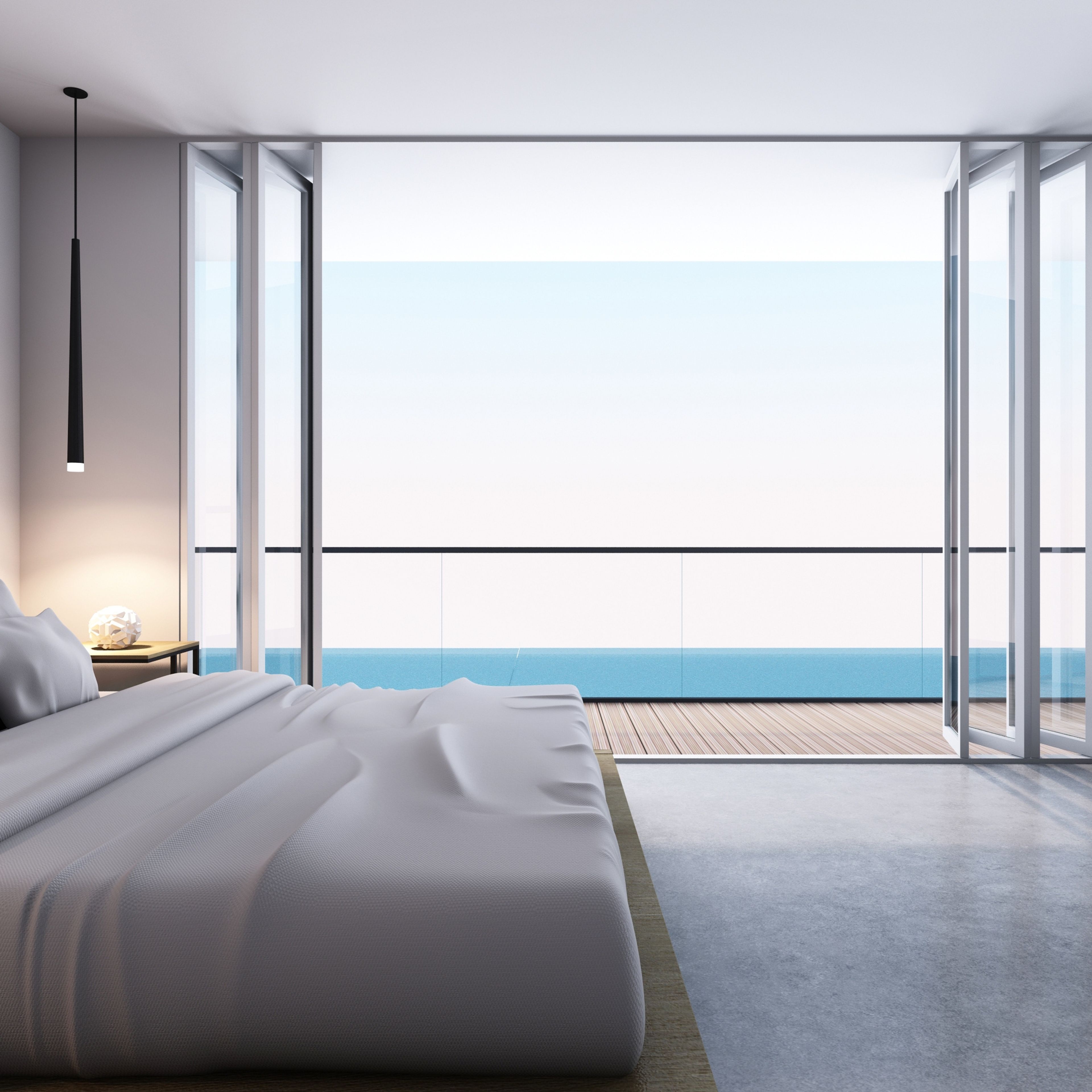 Hotelzimmer mit Bett und Meerblick